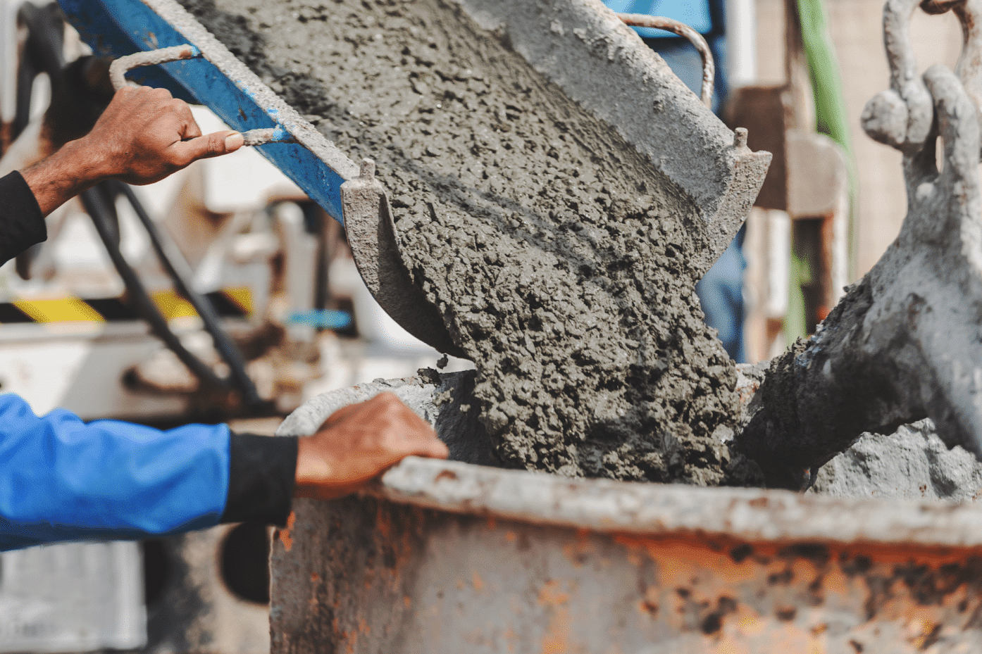 Concrete pouring into a metal pot